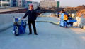 Mobile portable shot blasting machine for concrete pavement