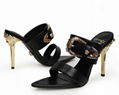         Palazzo stiletto pump with an iconic status         sandal mule  16