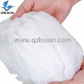 Air through embossed nonwoven fabric