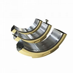 Trunnion bearing housings for grinding mills