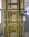 Electric hoist for cargo elevator