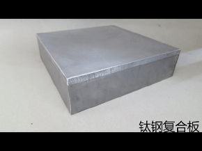 Titanium and steel cladding metal material 