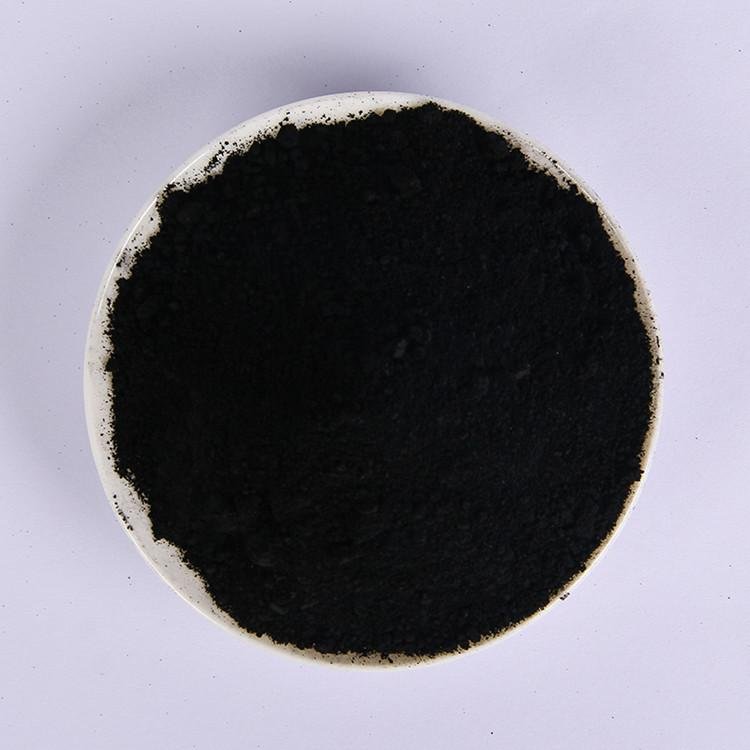 Decolorizing water treatment with wooden activated carbon
