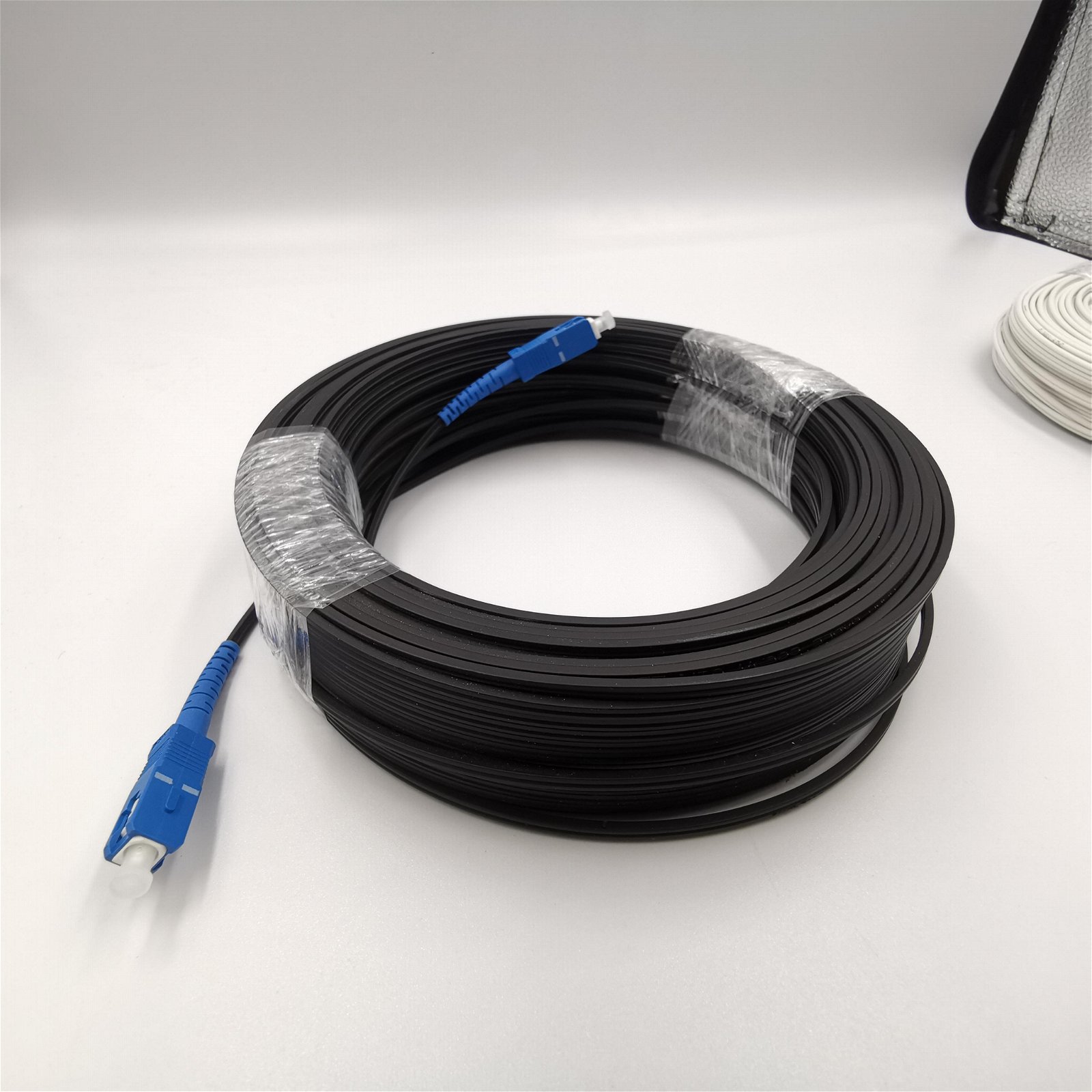 FTTX Outdoor Flat Drop Cable 100m,200m,1,2,4 Core,G657A2 Fiber Optic Cable FTTH  5