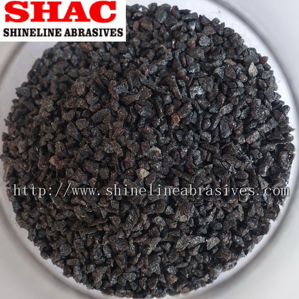 Brown aluminium oxide abrasive powder and grains