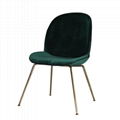 modern comfortable brass metal fully upholstered velvet Gubi beetle dining chair