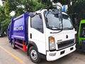 Sinotruck HOWO 8CBM RHD Garbage Compactor Truck Compressed Waste Truck with Chao 1