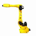 Industrial robot arm used for machine tool tending and material loading