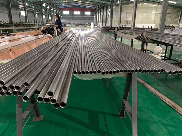 Titanium tube for heat exchanger and condenser