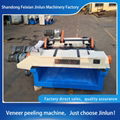 Veneer peeling machine