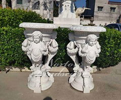 marble flowerpot with children statues