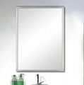 wall mounted steel edge mirror in lavatory use