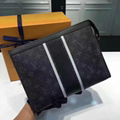 LOUIS VUITTON POCHETTE VOYAGE MM  LV Monogram Eclipse canvas Clutc