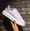 Alexander Mcqueen Raised sole low top leather trainers 