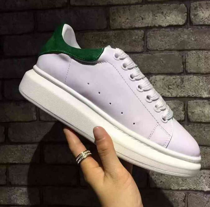 Alexander Mcqueen Raised sole low top leather trainers 