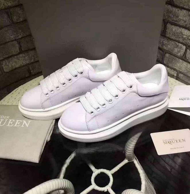 Alexander Mcqueen Raised sole low top leather trainers 