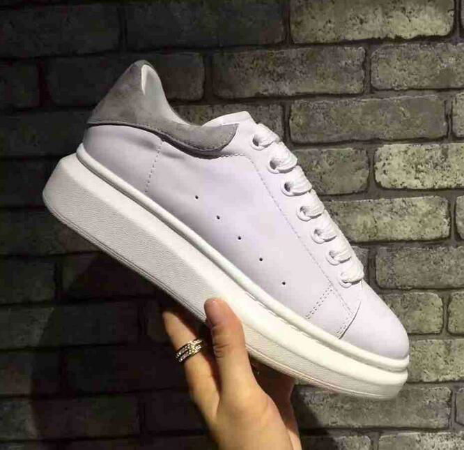 Alexander Mcqueen Raised sole low top leather trainers 