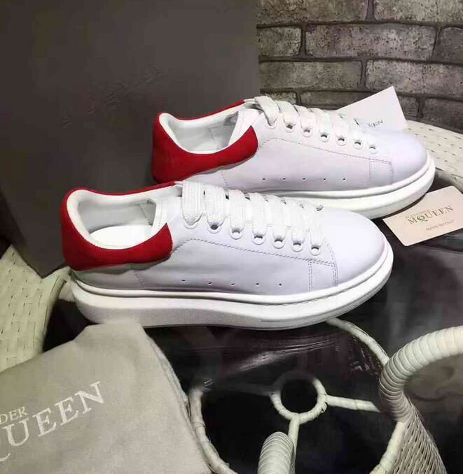 Alexander Mcqueen Raised sole low top leather trainers 