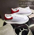 Alexander Mcqueen Raised sole low top leather trainers 