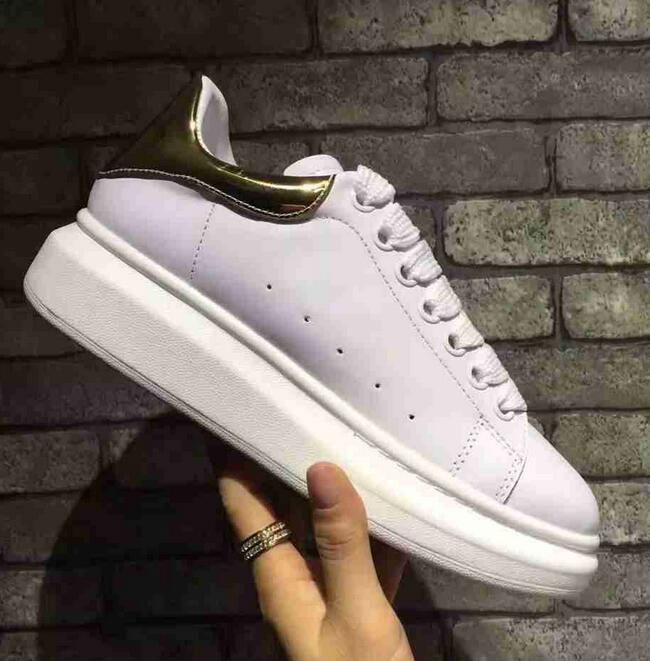 Alexander Mcqueen Raised sole low top leather trainers 