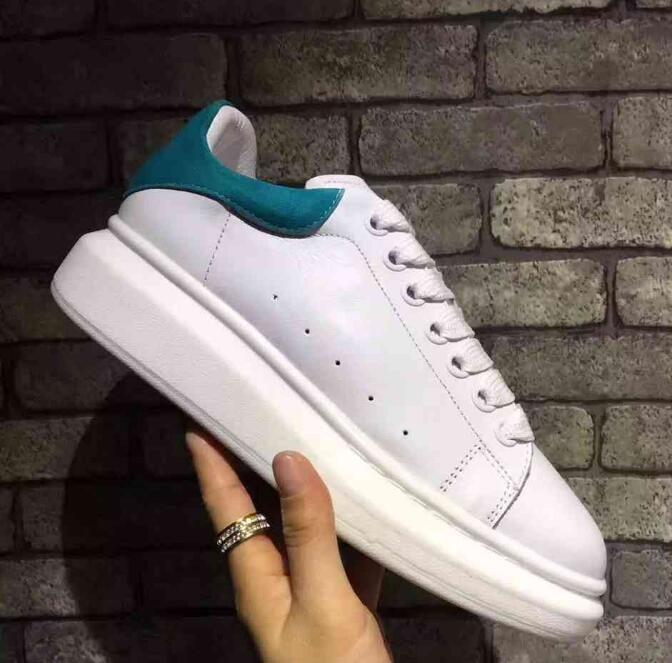 Alexander Mcqueen Raised sole low top leather trainers 