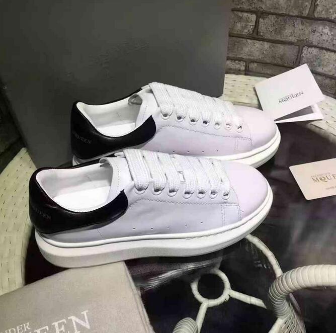 Alexander Mcqueen Raised sole low top leather trainers 