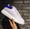 Alexander Mcqueen Raised sole low top leather trainers 