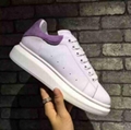 Alexander Mcqueen Raised sole low top leather trainers 