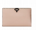 Valentino Garavani Rockstud Large Flip Lock Pouch Bag