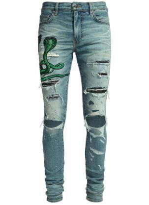 Amiri snake patch embroidered skinny jeans 