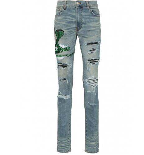 Amiri snake patch embroidered skinny jeans 