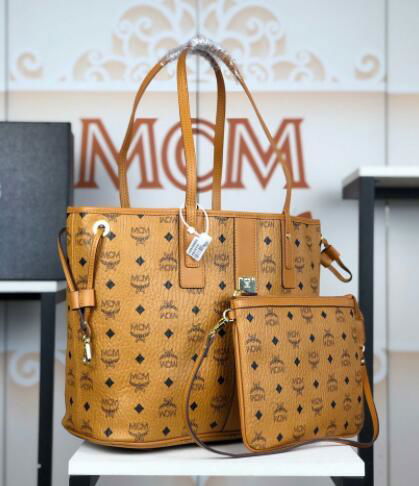 MCM Liz monogram-print tote bag mcm brown shopping tote handbag