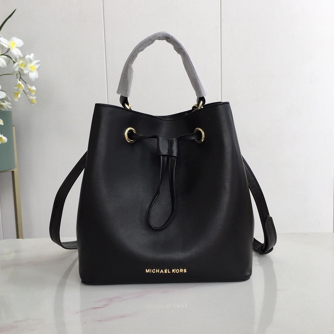 suri saffiano leather crossbody bag