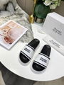 Alexander McQueen logo-print slides McQueen platform rubber debossed slides 