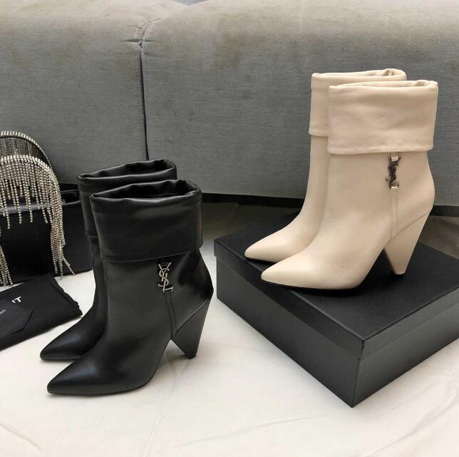 Saint Laurent Boots Niki leather ankle boots     fold over cuffs shorts