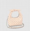 Louis Vuitton WHY KNOT PM handbag LV emblematic Mahina calf leather Bag