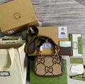 Gucci Bamboo 1947 jumbo GG mini bag Gucci Camel and ebony jumbo GG canvas