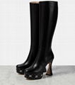 GUCCI GG knee-high leather boots GG embellished platform soles towering flared