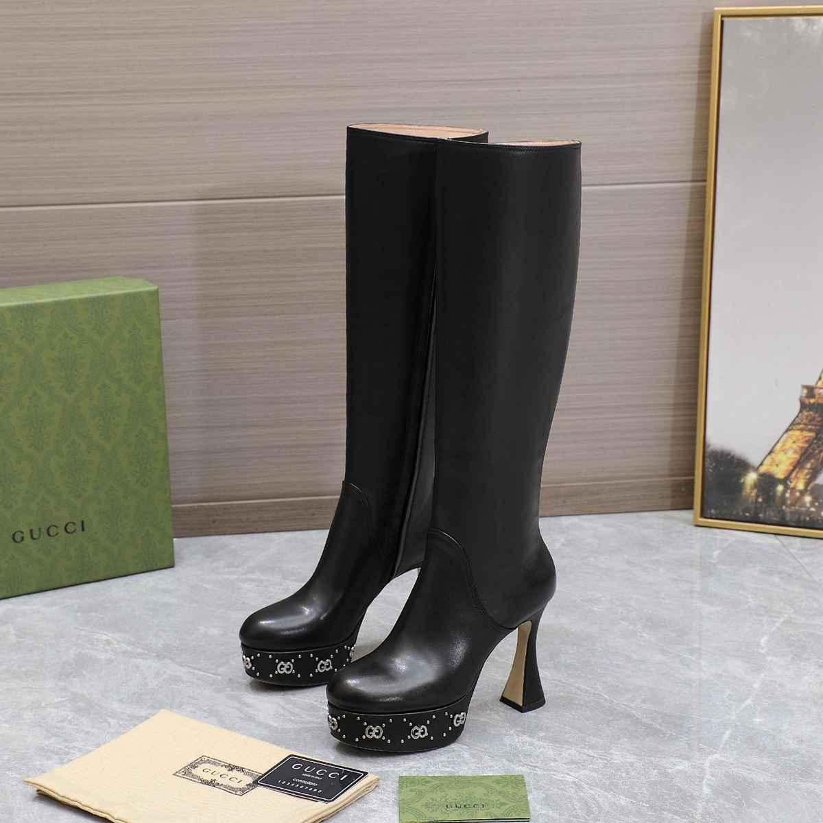       GG knee-high leather boots GG embellished platform soles towering flared