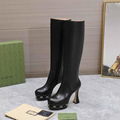       GG knee-high leather boots GG embellished platform soles towering flared