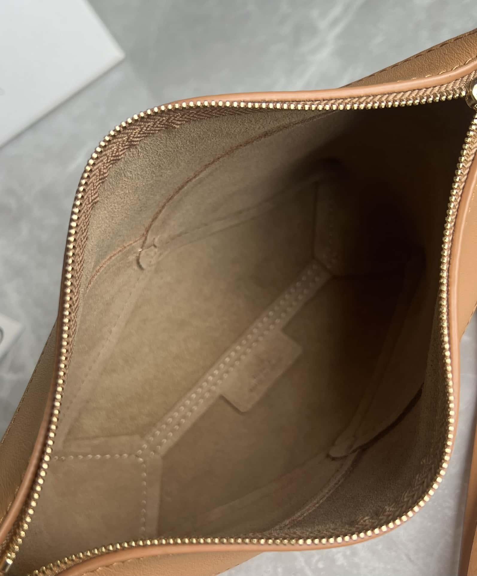       Puzzle Fold pouch in shiny nappa calfskin Black       hobo bag 11