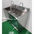 Stainless steel hand washing sink in hospital operating room