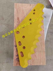 Feed mixer blade