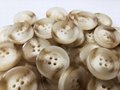 Polyester buttons 4-hole beige color size 25mm 3