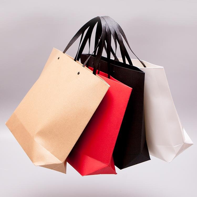 Custom Luxury Kraft Clothing Garment Packaging Shopping Paper Bags for Clothes 