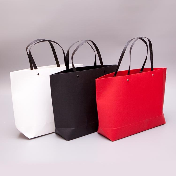 Custom Luxury Kraft Clothing Garment Packaging Shopping Paper Bags for Clothes  3