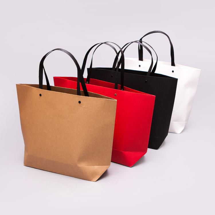Custom Luxury Kraft Clothing Garment Packaging Shopping Paper Bags for Clothes  4