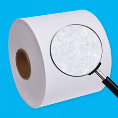 Hot air embossed, perforated non-woven fabric