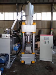 Scrap metal briquetting machine