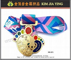 Design and production Finished medals, metal ribbons, medal tags